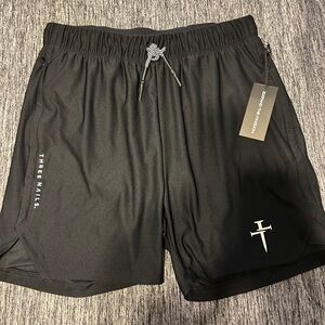 Three Nails black shorts